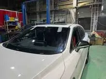 自動車修理工場での整備・修理作業の様子